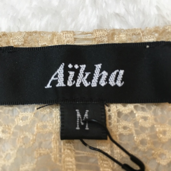 nude colored crop top, laced back, crossed front - Picture 5 of 5